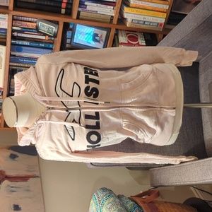 Hollister light pink zip up hoodie.